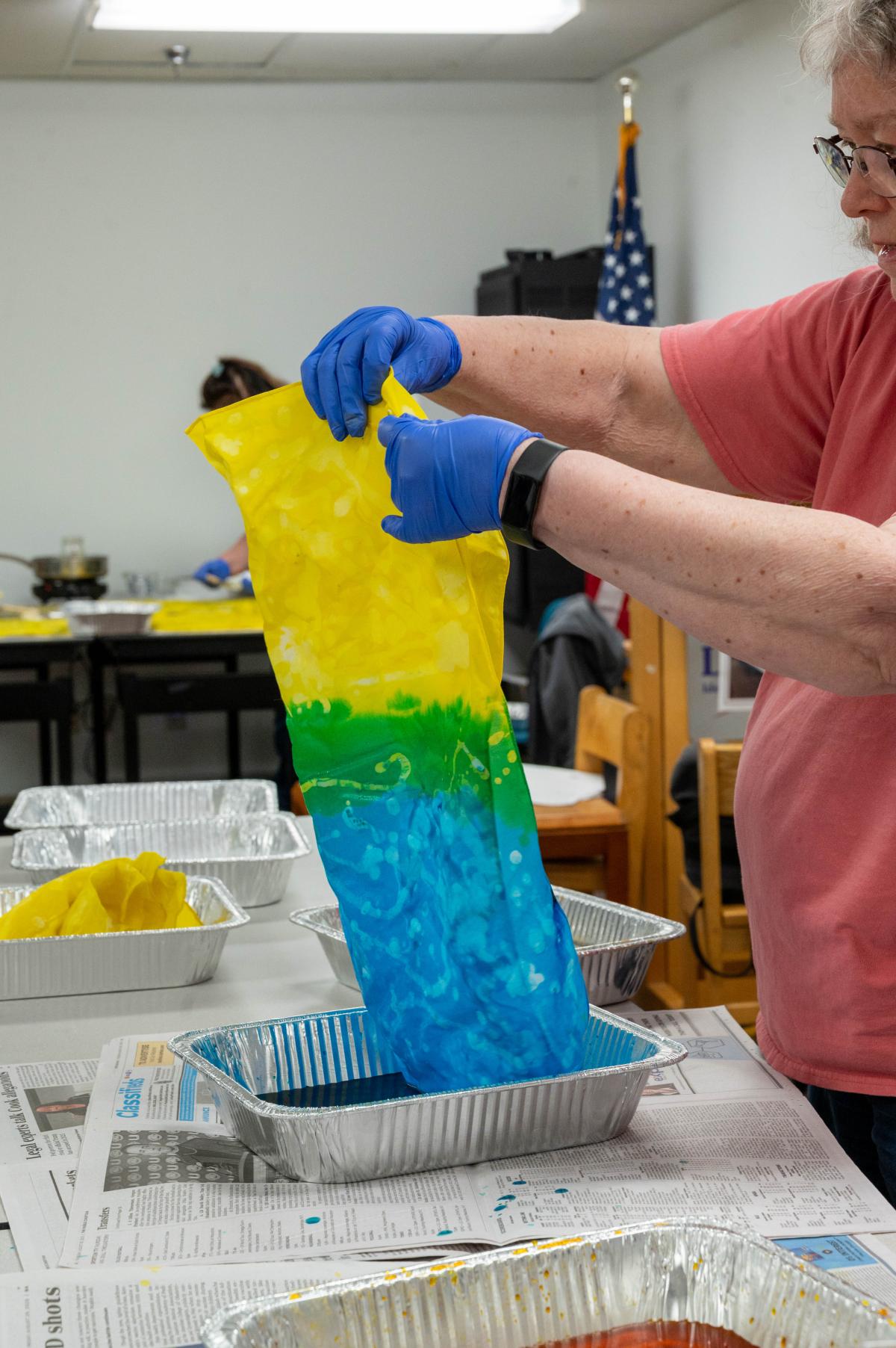 pperson doing tye dye craft